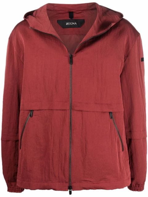 zipped-up hooded jacket